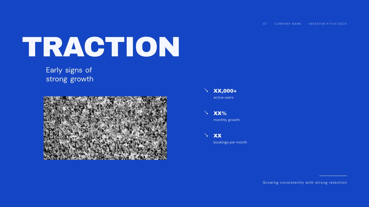 The Traction slide from Framekit's Investor Pitch Deck for a Seed Round template, with growth figures laid out for investors